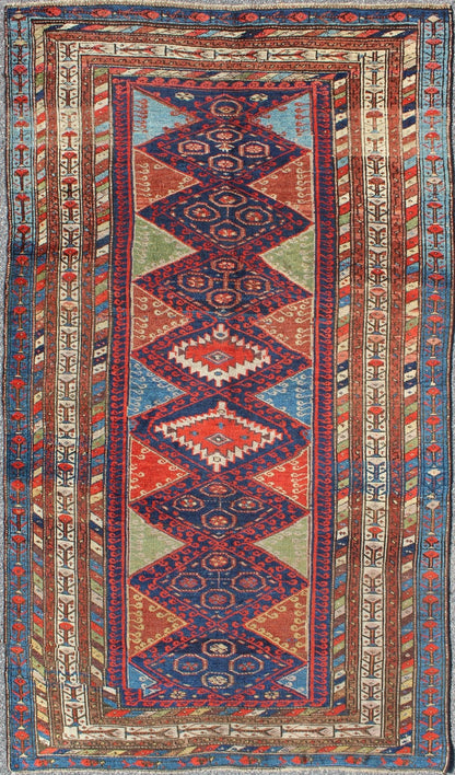 Antique Kurdish Kazak with Tribal and Geometric Motifs KWARUG C - 0525 Regardless of where you place this remarkable carpet, its stunning array of colors and exquisite geometric design will transport you to a place of rare, exotic beauty. Fashione... - Keivan Woven ArtsC - 0525 - 223