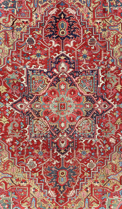 Antique Heriz Carpet with Stylized Floral Motifs and Complementary Border This magnificent antique Persian Heriz carpet from the early 20th century bears an exquisite design rendered in gorgeous, warm hues of red and various shades of blue. A hi... - Keivan Woven ArtsCA - 14882 - 517Rug
