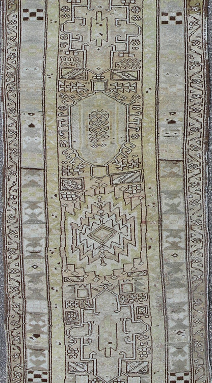 Antique Heriz Runner With Geometric Design in Taupe, Yellow Green, Olive & Brown. Long Antique Heriz Runner, rug /CA - 2440, country of origin / type: Persia / Heriz, circa 1930. This magnificent antique long Heriz runner from the early 20th Centur... - Keivan Woven ArtsCA - 2440 - 277