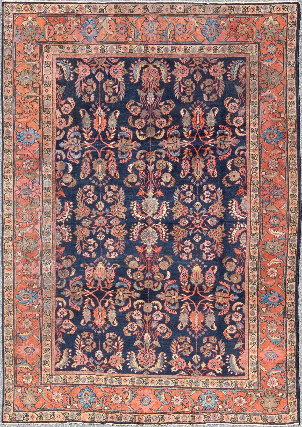 Antique Mahal Rug with Dark Blue Field & Coral Red Border Filled with Floral Motifs. Antique Mahal with Floral design. Keivan Woven Arts / rug CAM - B59, country of origin / type: Iran / Mahal/Sultanabad , circa 1920. Measures: 8 x 11'0. T... - Keivan Woven ArtsCAM - B59 - 736Rug