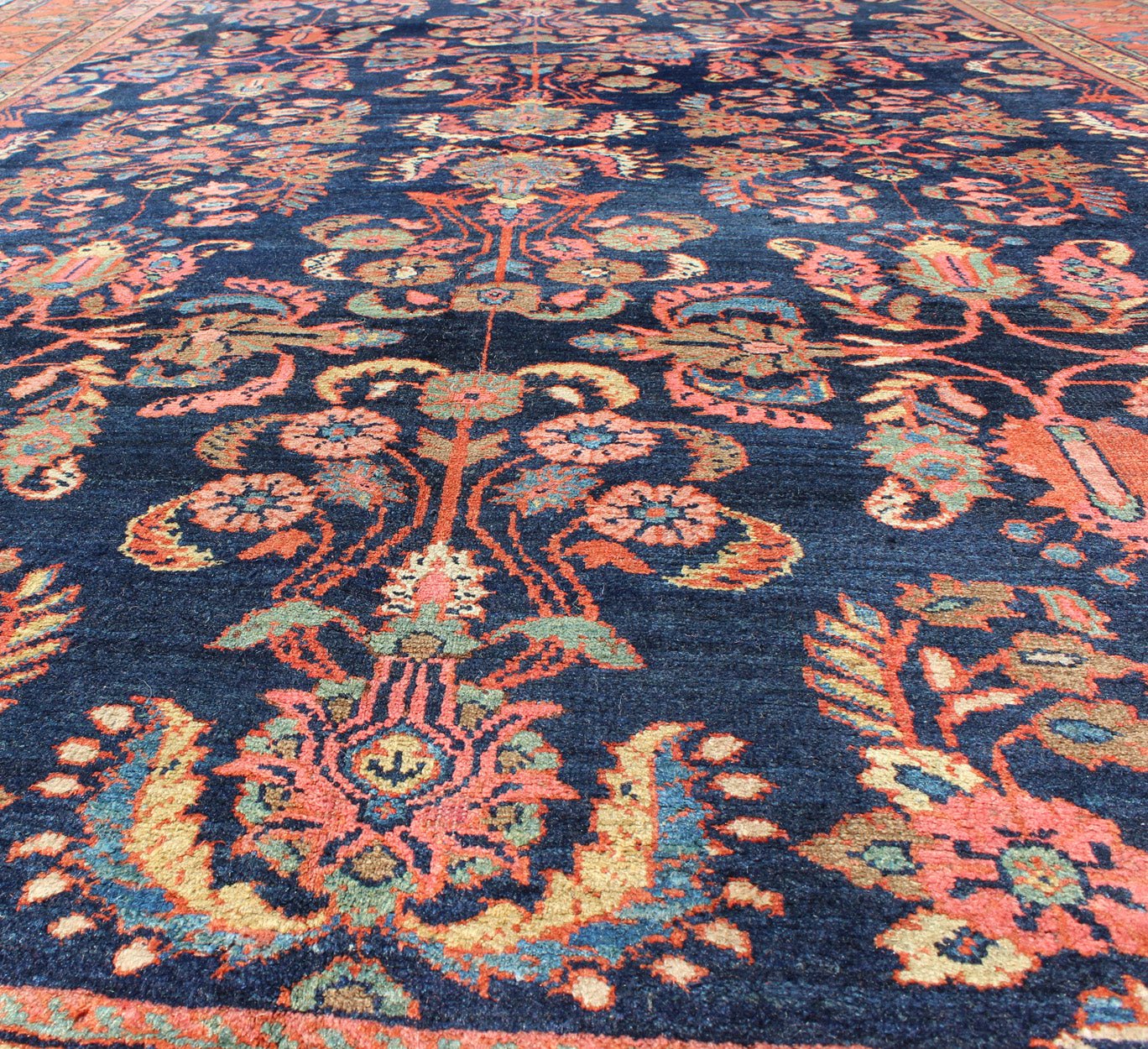 Antique Mahal Rug with Dark Blue Field & Coral Red Border Filled with Floral Motifs. Antique Mahal with Floral design. Keivan Woven Arts / rug CAM - B59, country of origin / type: Iran / Mahal/Sultanabad , circa 1920. Measures: 8 x 11'0. T... - Keivan Woven ArtsCAM - B59 - 736Rug