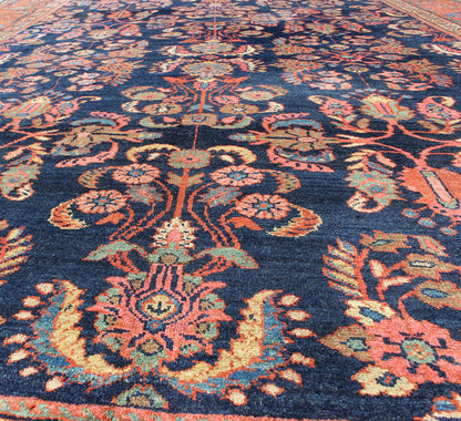 Antique Mahal Rug with Dark Blue Field & Coral Red Border Filled with Floral Motifs. Antique Mahal with Floral design. Keivan Woven Arts / rug CAM - B59, country of origin / type: Iran / Mahal/Sultanabad , circa 1920. Measures: 8 x 11'0. T... - Keivan Woven ArtsCAM - B59 - 736Rug