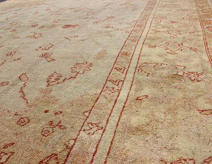 Antique Turkish Oushak Carpet In Red, Cream, and Yellow with A Muted Design. Keivan Woven Arts / rug CHM - 1623, country of origin / type: Turkey / Oushak, circa 1900 Measures: 10' x 12'5. This splendid, demure carpet from the turn of the 20th Cent... - Keivan Woven ArtsCHM - 1623 - 643Rug