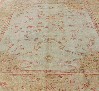 Antique Turkish Oushak Carpet In Red, Cream, and Yellow with A Muted Design. Keivan Woven Arts / rug CHM - 1623, country of origin / type: Turkey / Oushak, circa 1900 Measures: 10' x 12'5. This splendid, demure carpet from the turn of the 20th Cent... - Keivan Woven ArtsCHM - 1623 - 643Rug