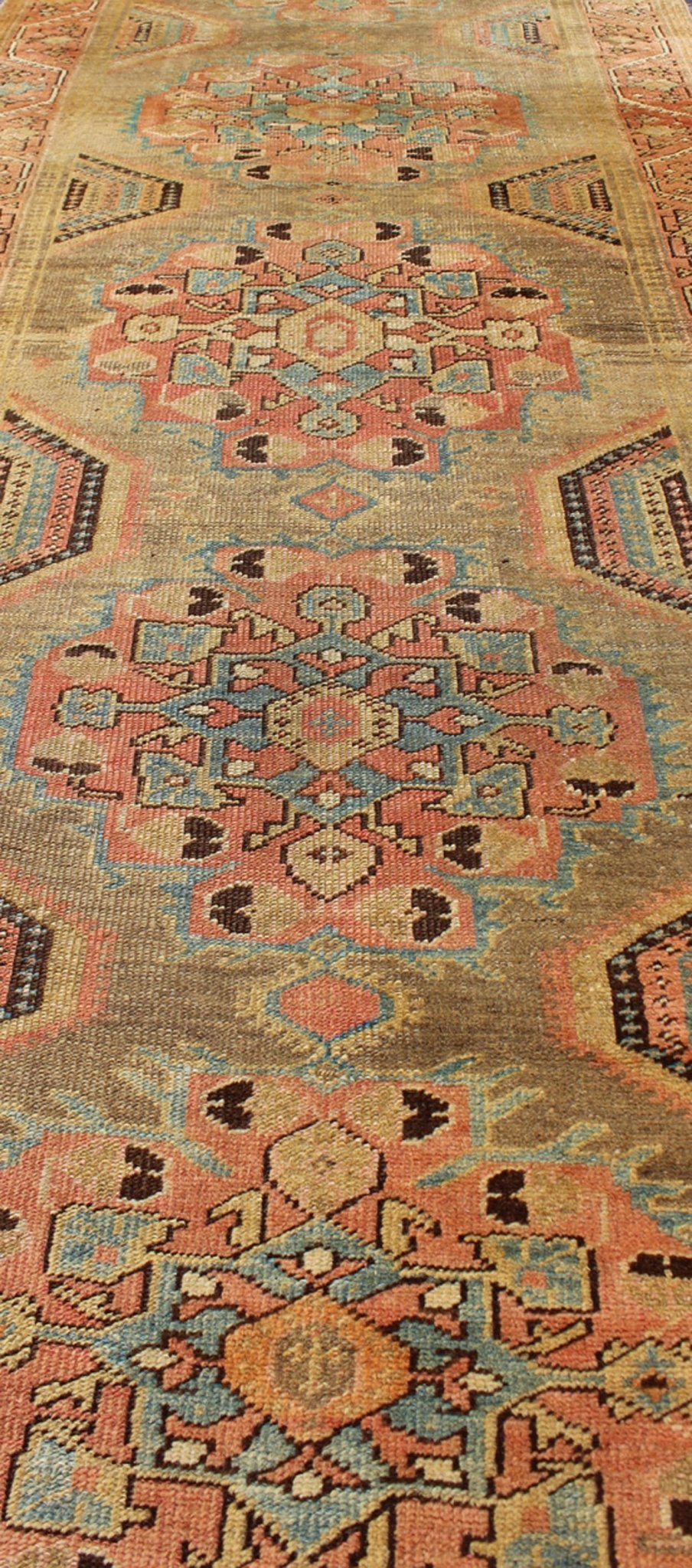 Early 20th Century Antique Oushak Runner with Medallions in Sand, Pink and Blue, rug chm - 2306, country of origin / type: Turkey / Oushak, circa 1920 This compelling and unique Oushak runner was made in the early 20th century, circa 1920, in Turk... - Keivan Woven ArtsCHM - 2306 - 1442Rug
