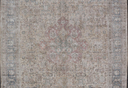Vintage Distressed Persian Tabriz Rug in Light Blue and Earth Tones by Keivan Woven Arts Vintage Muted Persian Tabriz Rug With Large Tribal Medallion in Earthy Tones. Vintage Distressed Persian Rug. Vintage Muted Persian Tabriz Rug With Large Tr... - Keivan Woven ArtsCRV - 10056227 - 21511