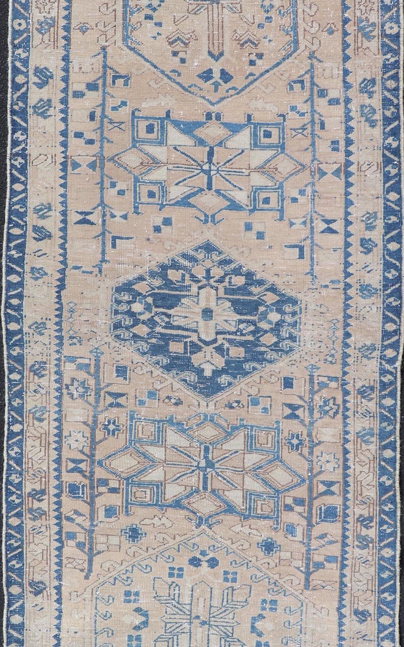 Vintage Persian Heriz Runner with Medallions in Light brown, Tan and Various Blue. Keivan Woven Arts rug CRV - 10056887, country of origin / type: Iran / Heriz, circa mid - 20th century Measures: 3'4 x 9'7 This magnificent Persian rug from the m... - Keivan Woven ArtsCRV - 10056887 - 21409Rug