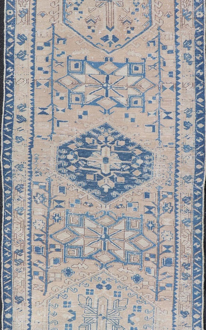 Vintage Persian Heriz Runner with Medallions in Light brown, Tan and Various Blue. Keivan Woven Arts rug CRV - 10056887, country of origin / type: Iran / Heriz, circa mid - 20th century Measures: 3'4 x 9'7 This magnificent Persian rug from the m... - Keivan Woven ArtsCRV - 10056887 - 21409Rug