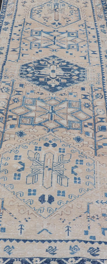 Vintage Persian Heriz Runner with Medallions in Light brown, Tan and Various Blue. Keivan Woven Arts rug CRV - 10056887, country of origin / type: Iran / Heriz, circa mid - 20th century Measures: 3'4 x 9'7 This magnificent Persian rug from the m... - Keivan Woven ArtsCRV - 10056887 - 21409Rug