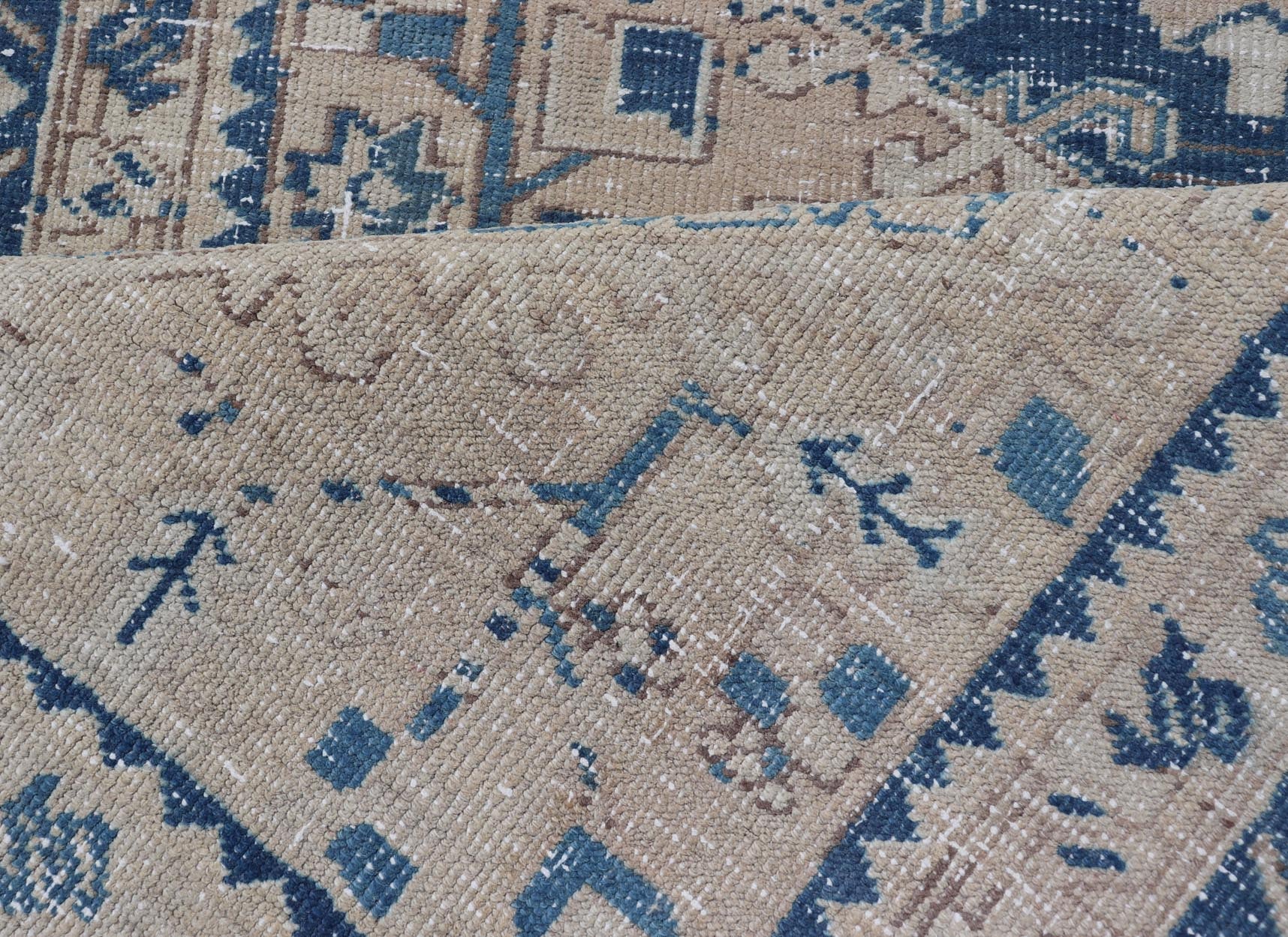 Vintage Persian Heriz Runner with Medallions in Light brown, Tan and Various Blue. Keivan Woven Arts rug CRV - 10056887, country of origin / type: Iran / Heriz, circa mid - 20th century Measures: 3'4 x 9'7 This magnificent Persian rug from the m... - Keivan Woven ArtsCRV - 10056887 - 21409Rug