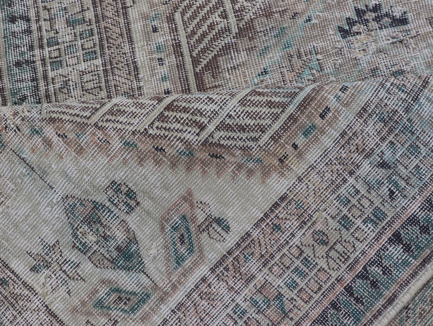 Vintage Persian Heriz Distressed Rug with Muted Colors and Medallion Design. Keivan Woven Arts / rug CRV - 10056889, country of origin / type: Iran / Tabriz, circa 1950 Measures: 3'4 x 10'4 This vintage Persian Tabriz carpet features a ref... - Keivan Woven ArtsCRV - 10056889 - 21415Rug