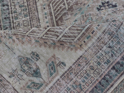 Vintage Persian Heriz Distressed Rug with Muted Colors and Medallion Design. Keivan Woven Arts / rug CRV - 10056889, country of origin / type: Iran / Tabriz, circa 1950 Measures: 3'4 x 10'4 This vintage Persian Tabriz carpet features a ref... - Keivan Woven ArtsCRV - 10056889 - 21415Rug