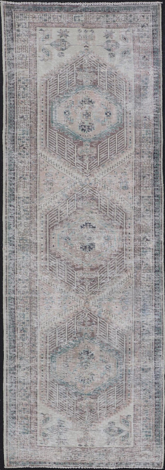 Vintage Persian Heriz Distressed Rug with Muted Colors and Medallion Design. Keivan Woven Arts / rug CRV - 10056889, country of origin / type: Iran / Tabriz, circa 1950 Measures: 3'4 x 10'4 This vintage Persian Tabriz carpet features a ref... - Keivan Woven ArtsCRV - 10056889 - 21415