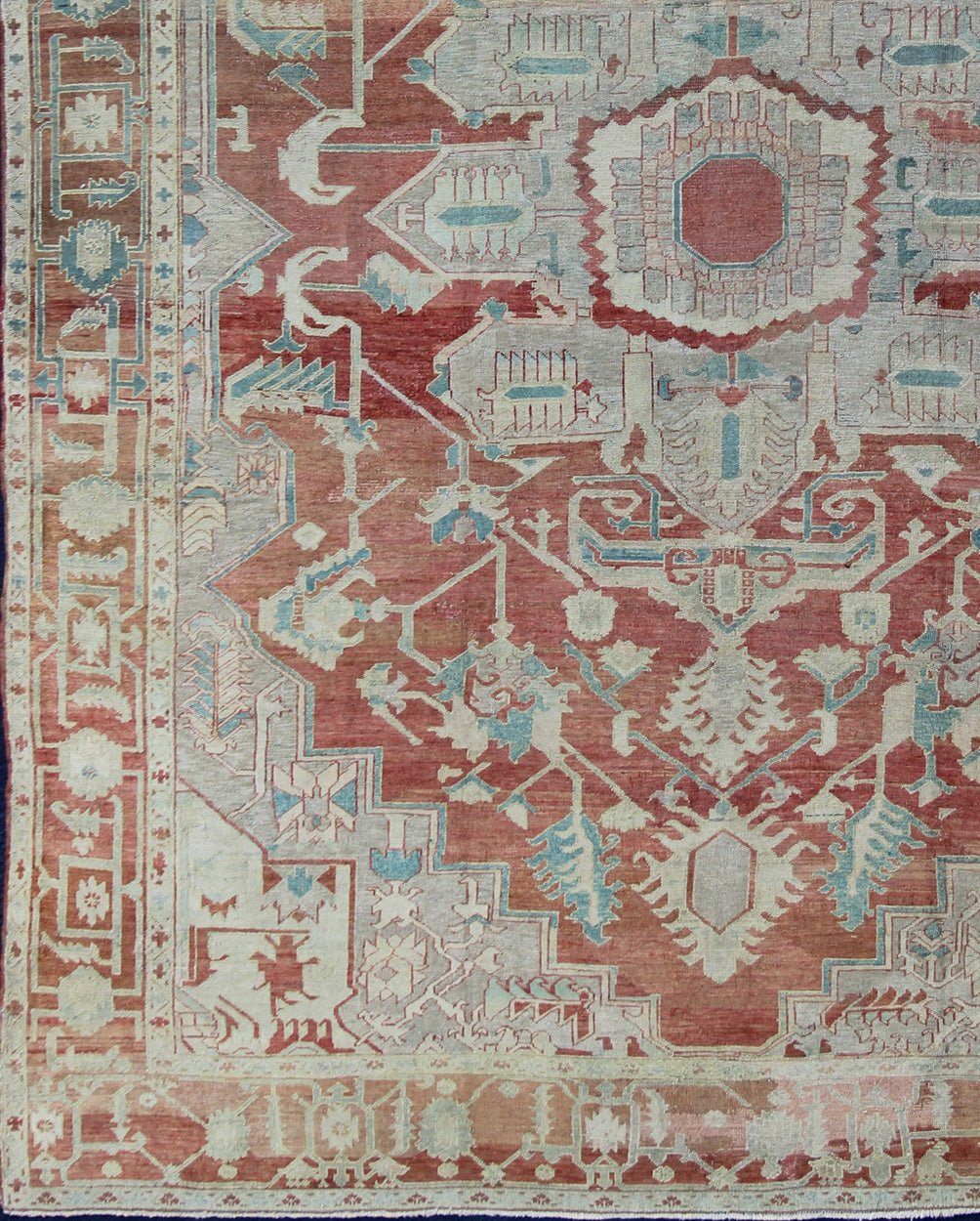 Antique Persian Serapi Rug This late 19th Century Serapi carpet displays an unusually light color palette and geometric design. A large multifaceted medallion of muted grays, taupes, blues and ivory rests upon a field in various shades of soft r... - Keivan Woven ArtsD - 0402 - 463Rug