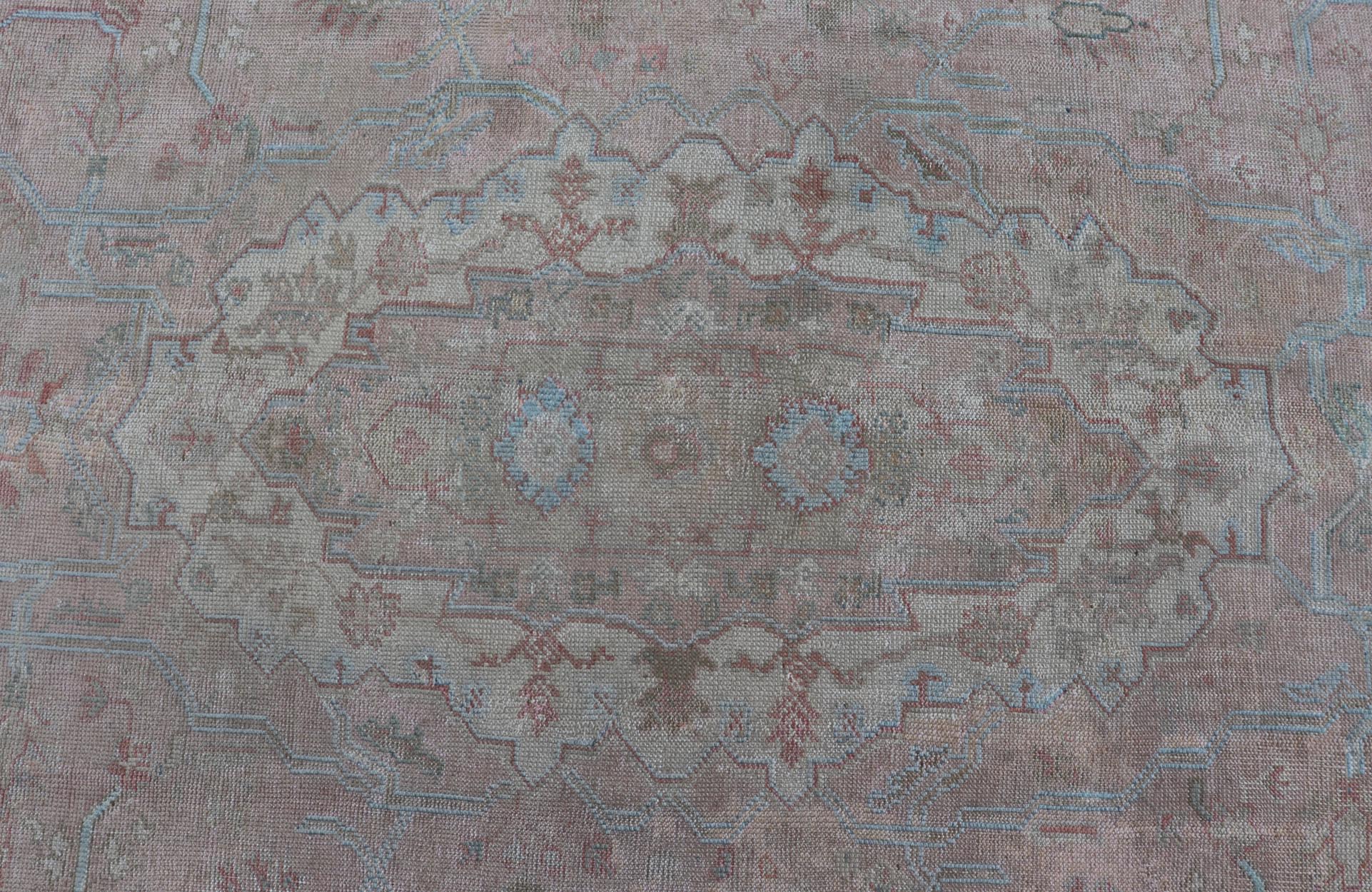 Large Antique Oushak Carpet in Light Pink Background with Light Blue Highlights. Antique Oushak carpet, Keivan Woven Arts / rug D - 0501, country of origin / type: Turkey / Oushak, circa Early - 20th Century. Measures: 11'8'' x 15'1''. This l... - Keivan Woven ArtsD - 0501 - 391Rug