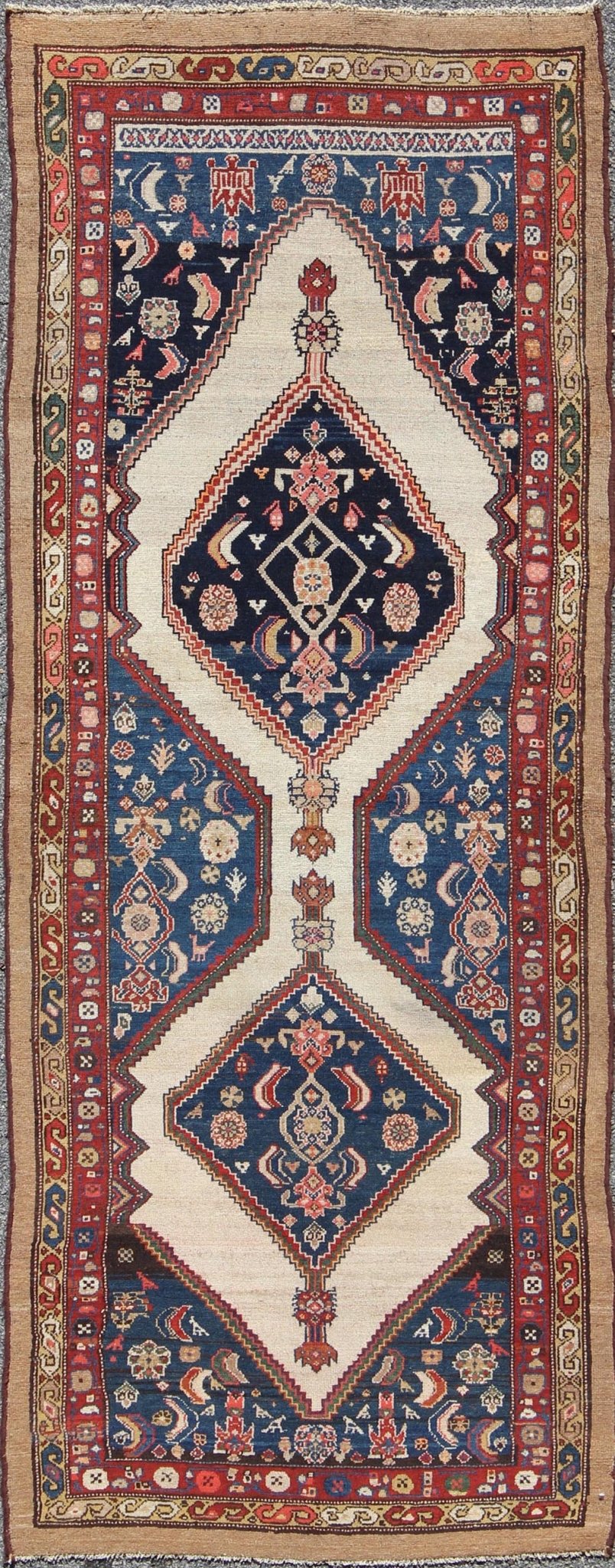 Antique Serab Runner This rare Antique Serab runner from the late 19th Century contains beautiful multi - colored dual medallions set within a contained border of cream. This is surrounded by a delightful field of blue, containing patterns of flow... - Keivan Woven ArtsD - 0529 - 1382Rug