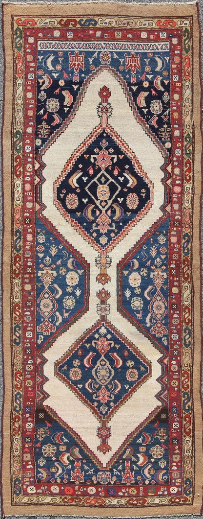 Antique Serab Runner This rare Antique Serab runner from the late 19th Century contains beautiful multi - colored dual medallions set within a contained border of cream. This is surrounded by a delightful field of blue, containing patterns of flow... - Keivan Woven ArtsD - 0529 - 1382Rug