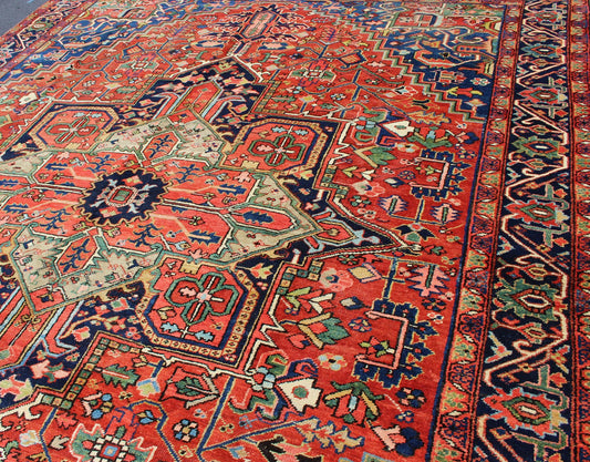 Colorful Antique Persian Heriz - Serapi With Geometric Medallion Design. Keivan Woven Arts / Rug / D - 0907 / country of origin / type: Iran /Heriz, circa 1920's. Measures: 9'5 x 12'. Made in the early 20th century, this charming Heriz - Serapi with a... - Keivan Woven ArtsD - 0907 - 521