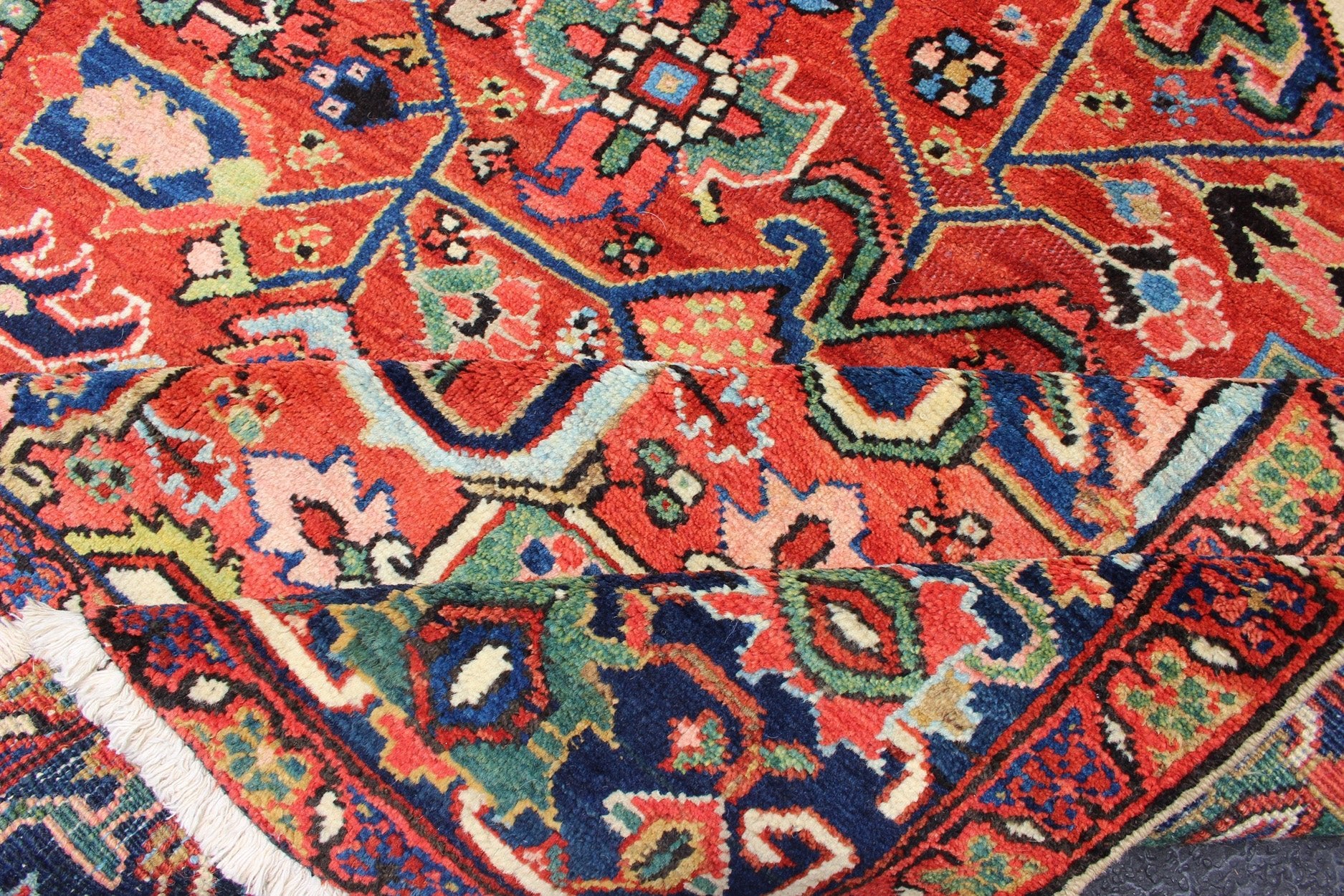 Colorful Antique Persian Heriz - Serapi With Geometric Medallion Design. Keivan Woven Arts / Rug / D - 0907 / country of origin / type: Iran /Heriz, circa 1920's. Measures: 9'5 x 12'. Made in the early 20th century, this charming Heriz - Serapi with a... - Keivan Woven ArtsD - 0907 - 521Rug