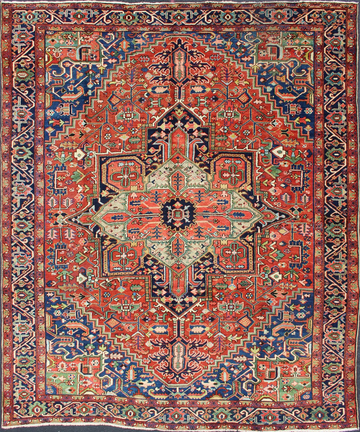 Colorful Antique Persian Heriz - Serapi With Geometric Medallion Design. Keivan Woven Arts / Rug / D - 0907 / country of origin / type: Iran /Heriz, circa 1920's. Measures: 9'5 x 12'. Made in the early 20th century, this charming Heriz - Serapi with a... - Keivan Woven ArtsD - 0907 - 521Rug