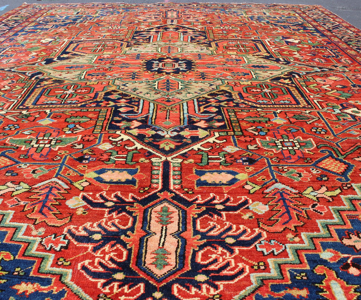 Colorful Antique Persian Heriz - Serapi With Geometric Medallion Design. Keivan Woven Arts / Rug / D - 0907 / country of origin / type: Iran /Heriz, circa 1920's. Measures: 9'5 x 12'. Made in the early 20th century, this charming Heriz - Serapi with a... - Keivan Woven ArtsD - 0907 - 521Rug