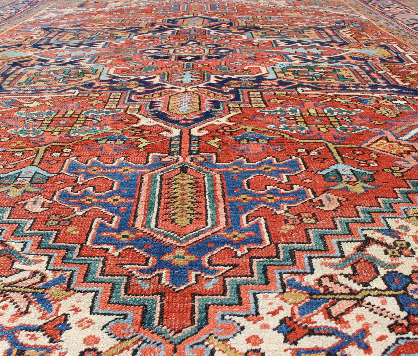 Antique Colorful Persian Heriz Rug with Geometric Patterns and Intricate Design. Keivan Woven Arts / rug D - 0927, country of origin / type: Iran / Heriz, Heriz - Serapi , circa 1920 Measures: 8'3 x 10'4 This magnificent antique Persian He... - Keivan Woven ArtsD - 0927 - 758Rug