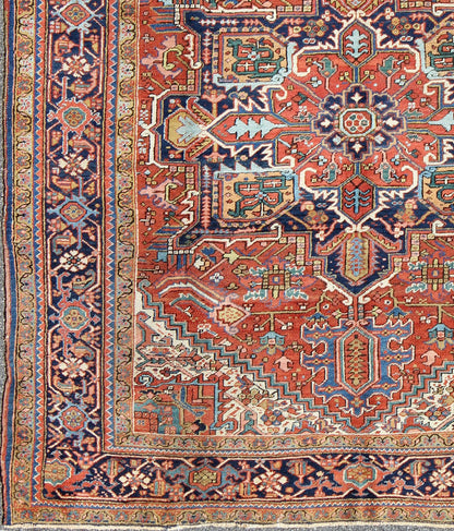 Antique Colorful Persian Heriz Rug with Geometric Patterns and Intricate Design. Keivan Woven Arts / rug D - 0927, country of origin / type: Iran / Heriz, Heriz - Serapi , circa 1920 Measures: 8'3 x 10'4 This magnificent antique Persian He... - Keivan Woven ArtsD - 0927 - 758Rug
