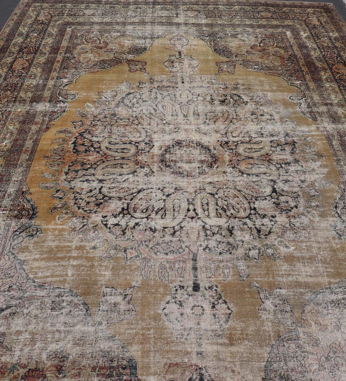 19th Century Lavar Kerman Rug with Gold, Sand - and Camel - Colored Tones This magnificent antique Kerman carpet from the third quarter of 19th century is an absolutely stunning achievement of Persian craftsmanship and design. It was expertly woven... - Keivan Woven ArtsD - 0929 - 2627Rug