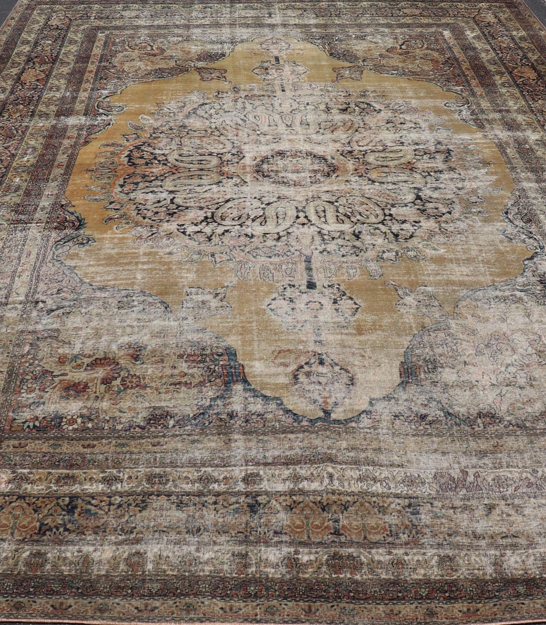 19th Century Lavar Kerman Rug with Gold, Sand - and Camel - Colored Tones This magnificent antique Kerman carpet from the third quarter of 19th century is an absolutely stunning achievement of Persian craftsmanship and design. It was expertly woven... - Keivan Woven ArtsD - 0929 - 2627Rug