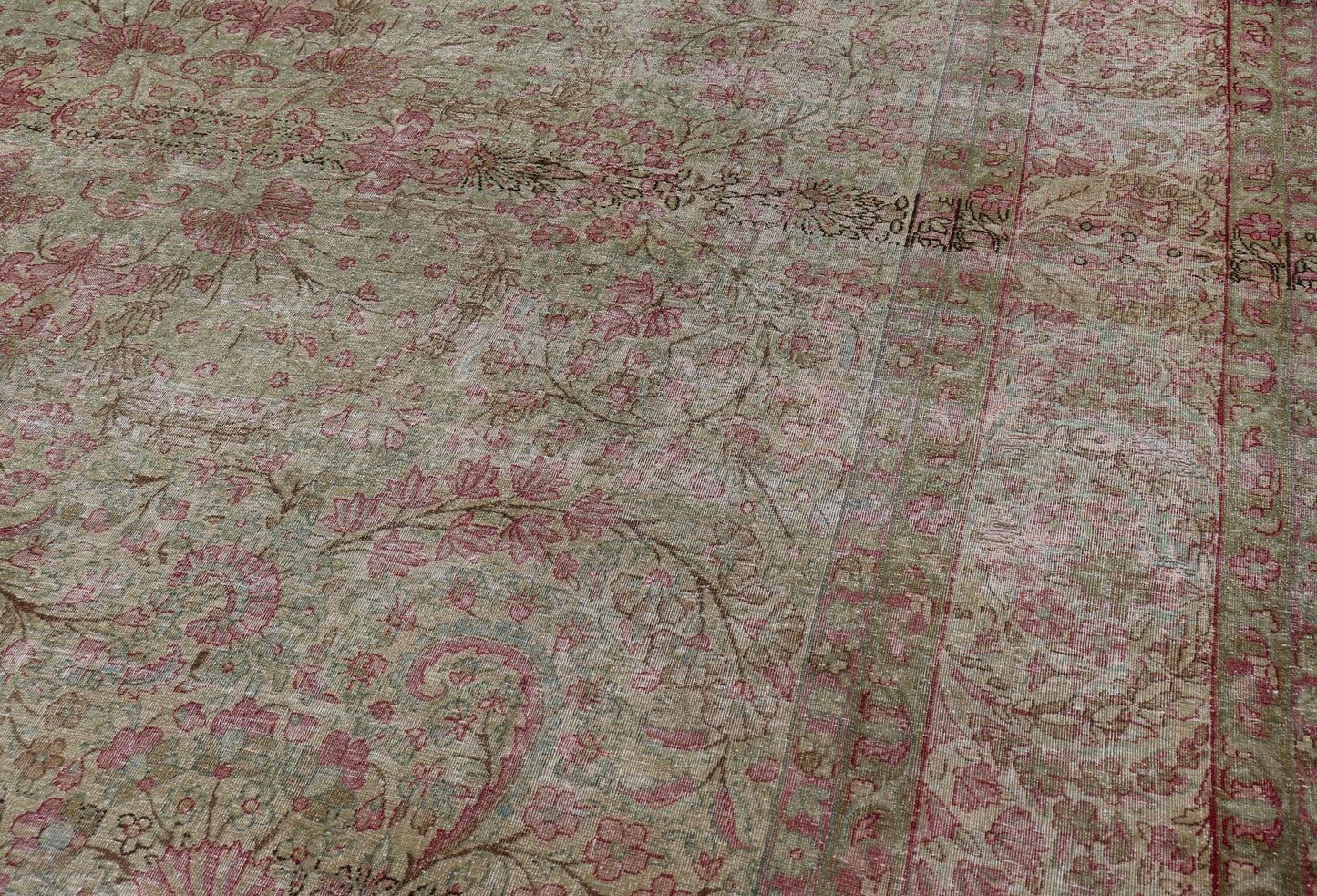 Antique Persian Lavar Kerman Rug with Multicolored, Blossoming, All - Over Floral Motifs. Rug/D - 1210, antique Kerman, antique distressed rug. This beautiful antique distressed Persian Kerman Lavar rug from the early 20th century features very pale... - Keivan Woven ArtsD - 1210 - 661Rug
