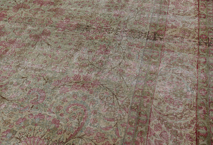 Antique Persian Lavar Kerman Rug with Multicolored, Blossoming, All - Over Floral Motifs. Rug/D - 1210, antique Kerman, antique distressed rug. This beautiful antique distressed Persian Kerman Lavar rug from the early 20th century features very pale... - Keivan Woven ArtsD - 1210 - 661Rug