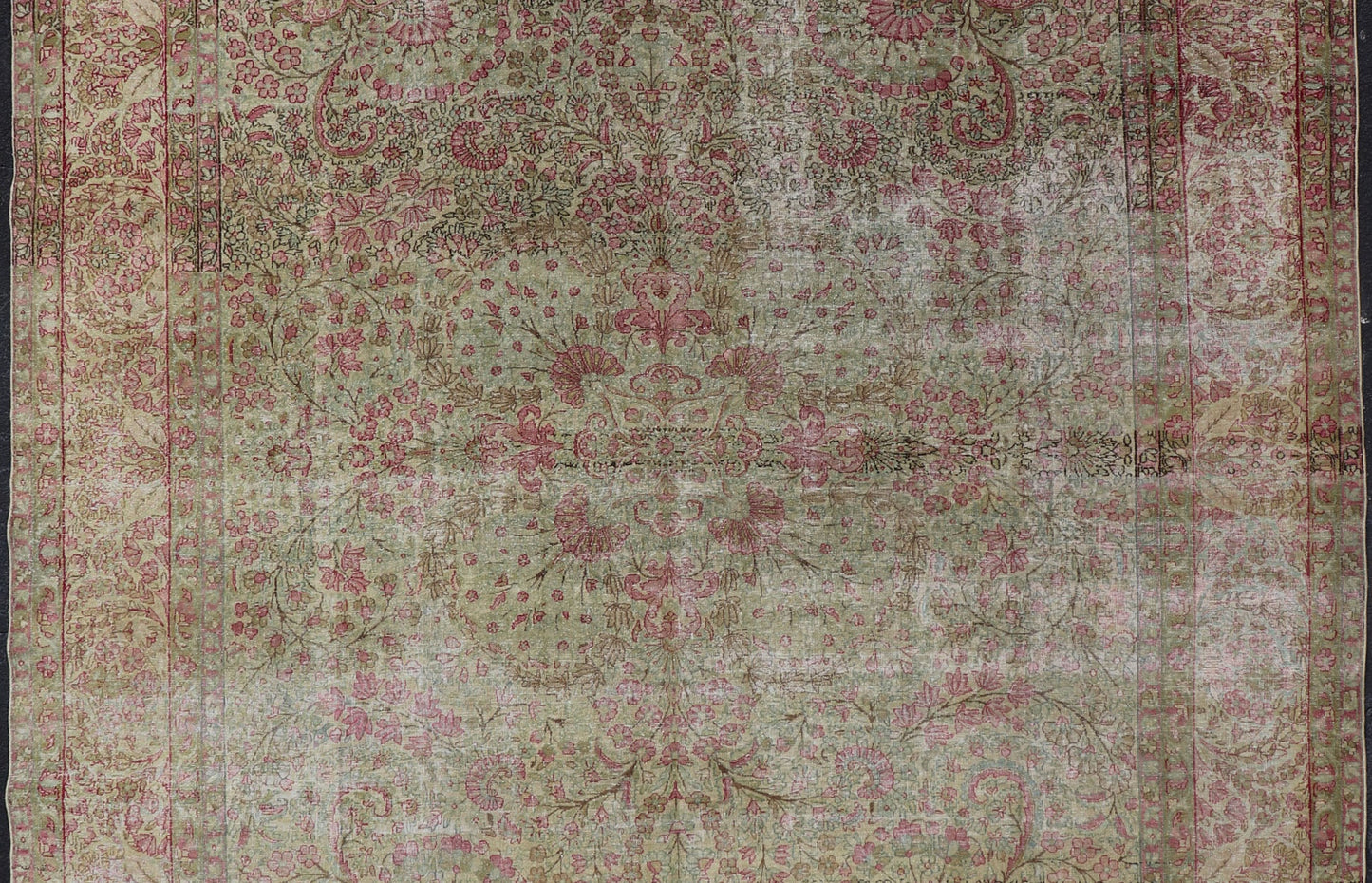 Antique Persian Lavar Kerman Rug with Multicolored, Blossoming, All - Over Floral Motifs. Rug/D - 1210, antique Kerman, antique distressed rug. This beautiful antique distressed Persian Kerman Lavar rug from the early 20th century features very pale... - Keivan Woven ArtsD - 1210 - 661Rug