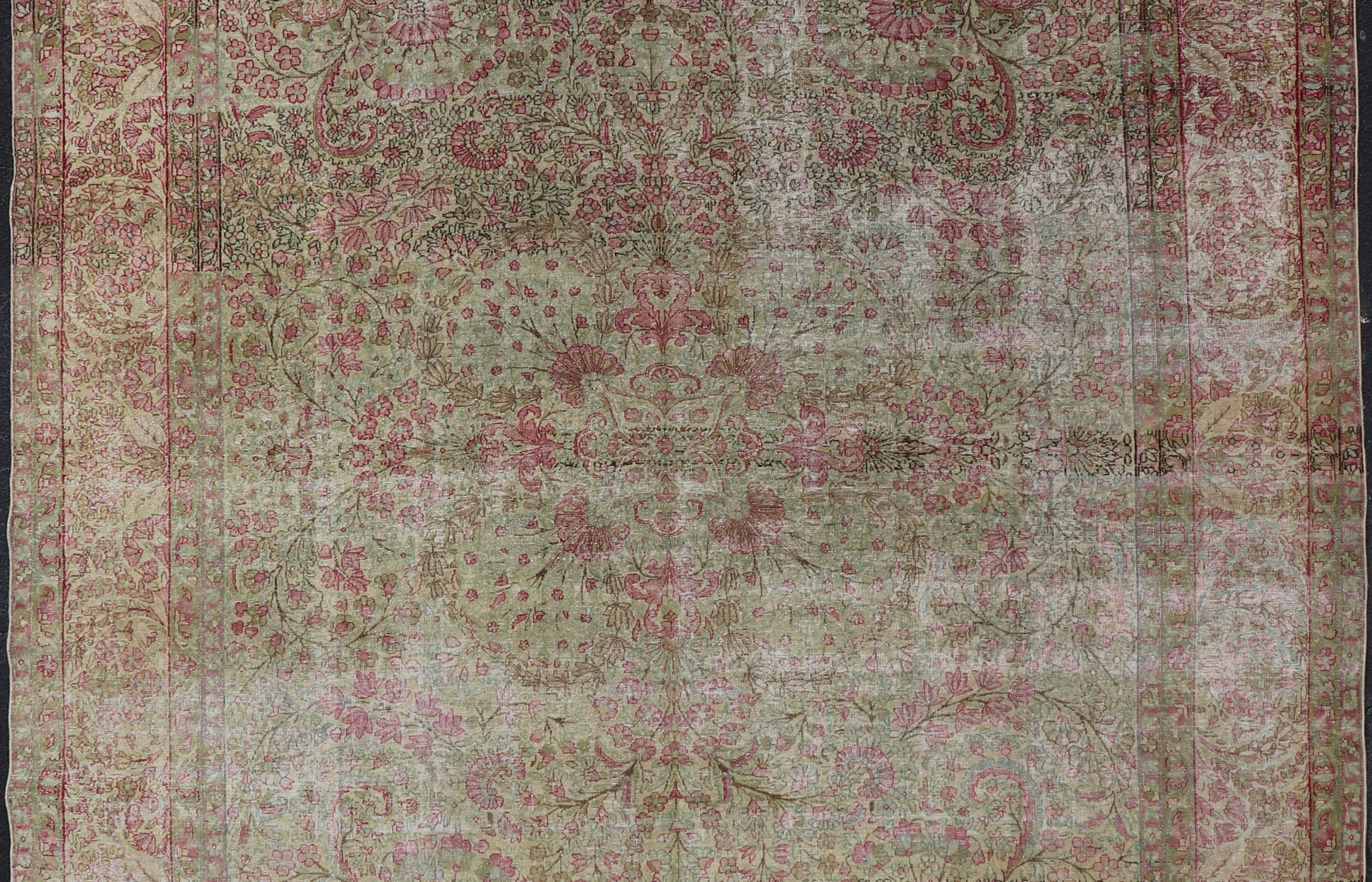 Antique Persian Lavar Kerman Rug with Multicolored, Blossoming, All - Over Floral Motifs. Rug/D - 1210, antique Kerman, antique distressed rug. This beautiful antique distressed Persian Kerman Lavar rug from the early 20th century features very pale... - Keivan Woven ArtsD - 1210 - 661Rug