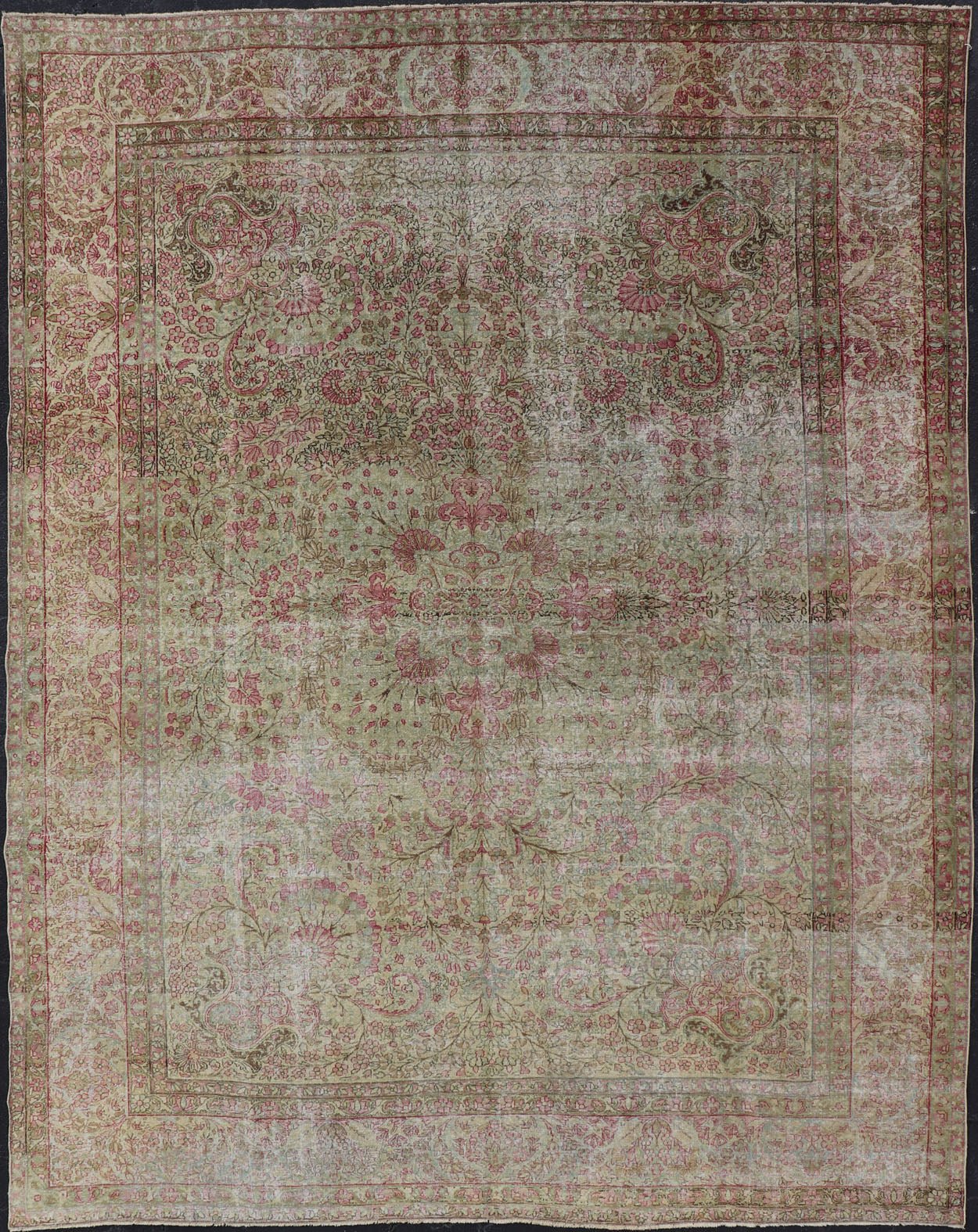Antique Persian Lavar Kerman Rug with Multicolored, Blossoming, All - Over Floral Motifs. Rug/D - 1210, antique Kerman, antique distressed rug. This beautiful antique distressed Persian Kerman Lavar rug from the early 20th century features very pale... - Keivan Woven ArtsD - 1210 - 661Rug