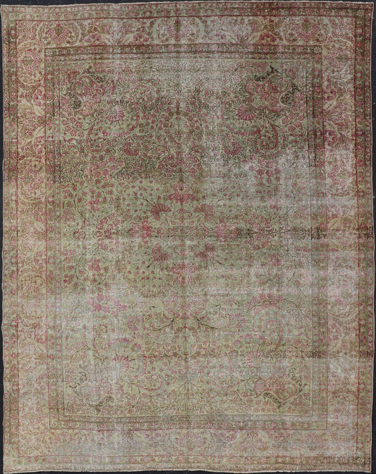 Antique Persian Lavar Kerman Rug with Multicolored, Blossoming, All - Over Floral Motifs. Rug/D - 1210, antique Kerman, antique distressed rug. This beautiful antique distressed Persian Kerman Lavar rug from the early 20th century features very pale... - Keivan Woven ArtsD - 1210 - 661Rug