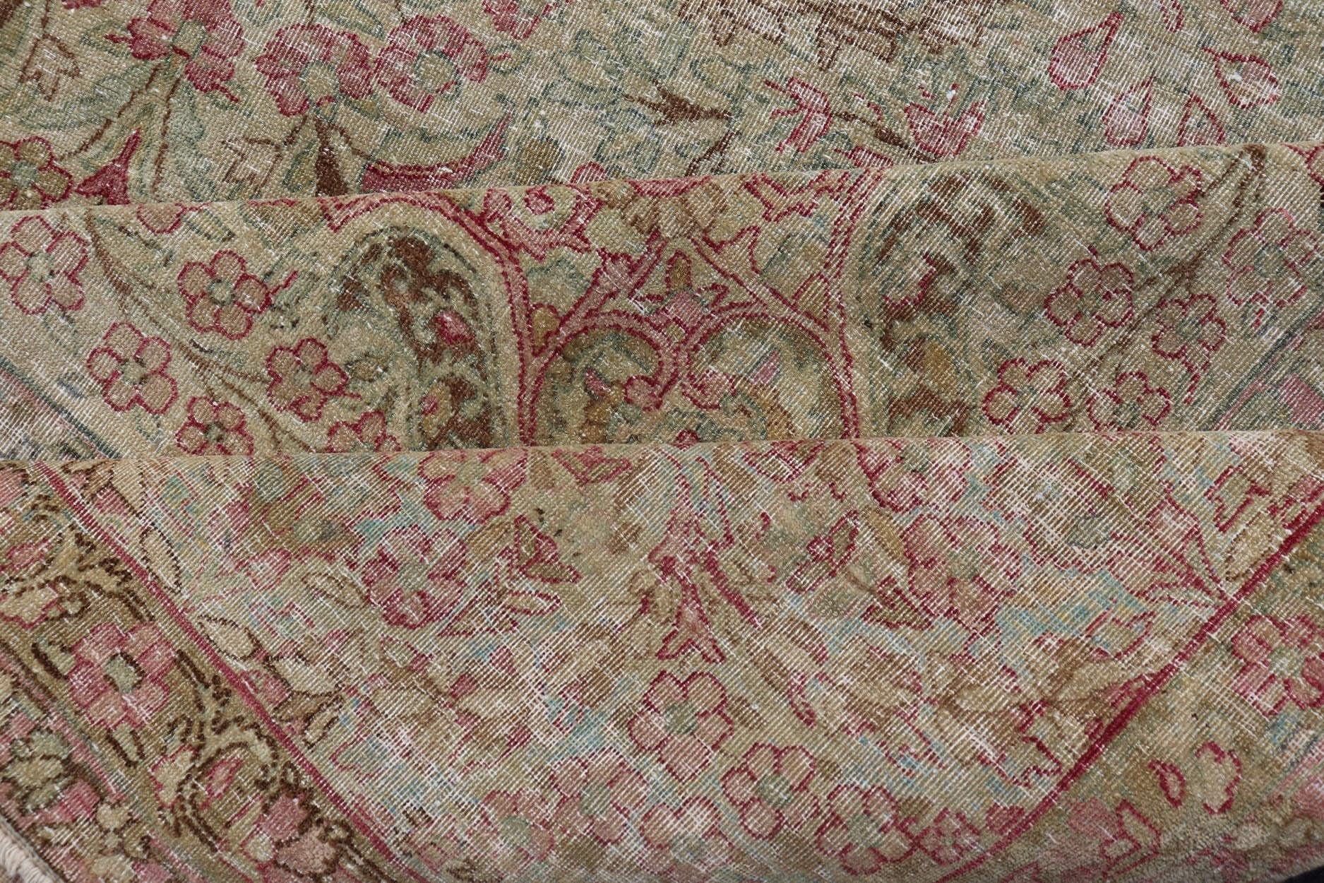 Antique Persian Lavar Kerman Rug with Multicolored, Blossoming, All - Over Floral Motifs. Rug/D - 1210, antique Kerman, antique distressed rug. This beautiful antique distressed Persian Kerman Lavar rug from the early 20th century features very pale... - Keivan Woven ArtsD - 1210 - 661Rug