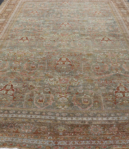 Distressed Antique Persian Sultanabad Rug in Faded Grey Background with green, salmon, pink, brown. distressed antique rug, distressed antique Sultanabad, distressed antique Mahal. Antique distressed Persian rug. Sultanabad Mahal antique rug fro... - Keivan Woven ArtsDAN - 1701 - 8493Rug