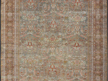 Distressed Antique Persian Sultanabad Rug in Faded Grey Background with green, salmon, pink, brown. distressed antique rug, distressed antique Sultanabad, distressed antique Mahal. Antique distressed Persian rug. Sultanabad Mahal antique rug fro... - Keivan Woven ArtsDAN - 1701 - 8493Rug