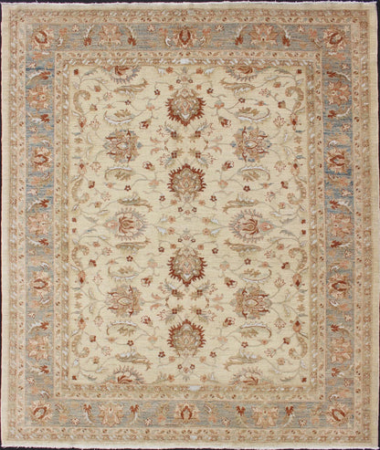 Keivan Woven Arts Vintage Cream Sultanabad Rug With Pops of Blue and Red Keivan Woven Arts, Dsp - 1129, Muted Fine Sultanabad Rug With Pops of Blue and Red, This elegantly hand woven rug is from Pakistan and woven from the finest wool to create a sof... - Keivan Woven ArtsDSP - 1129 - 4740Rug