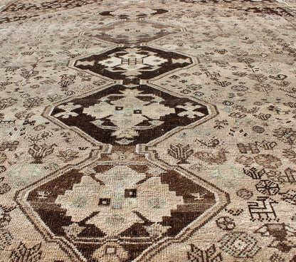 Brown/Taupe Vintage Persian Shiraz Rug with Vertical Sub - Geometric Medallions kwarugs Brown/Taupe Vintage Persian Shiraz rug with Vertical Sub - Geometric Medallions, Keivan Woven Arts / rug DSP - A342934, country of origin / type: Iran / Shiraz, ci... - Keivan Woven ArtsDSP - A342934 - 4335Rug