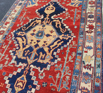 Vintage Turkish Tribal Rug with Jewel - Toned Central Medallion and Vivid Border This vintage Turkish Tribal rug features a large central medallion and a jewel - toned geometric design surrounded by a vivid blue and ivory border. Measures: 4'9 x ... - Keivan Woven ArtsDSP - WL30362 - 4134Rug