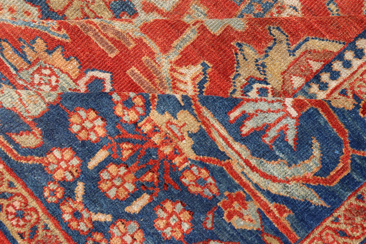 Antique Sultanabad Carpet This large and inspiring Sultanabad from the late 19 century is set apart from its peers due to its all over geometric design which floods the primary field. A luxurious base of soft tomato red contains a meticulous arr... - Keivan Woven ArtsE - 0101 - 475Rug