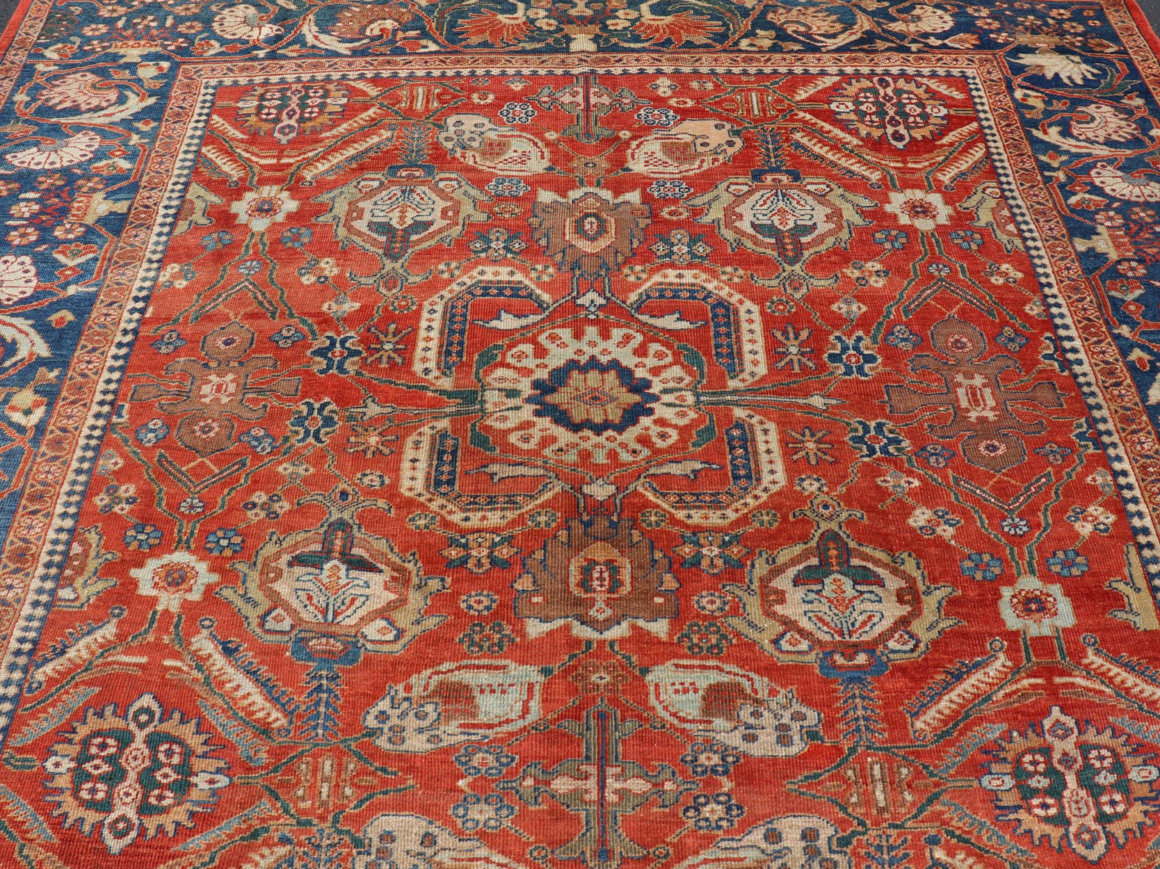 Antique Sultanabad Carpet This large and inspiring Sultanabad from the late 19 century is set apart from its peers due to its all over geometric design which floods the primary field. A luxurious base of soft tomato red contains a meticulous arr... - Keivan Woven ArtsE - 0101 - 475