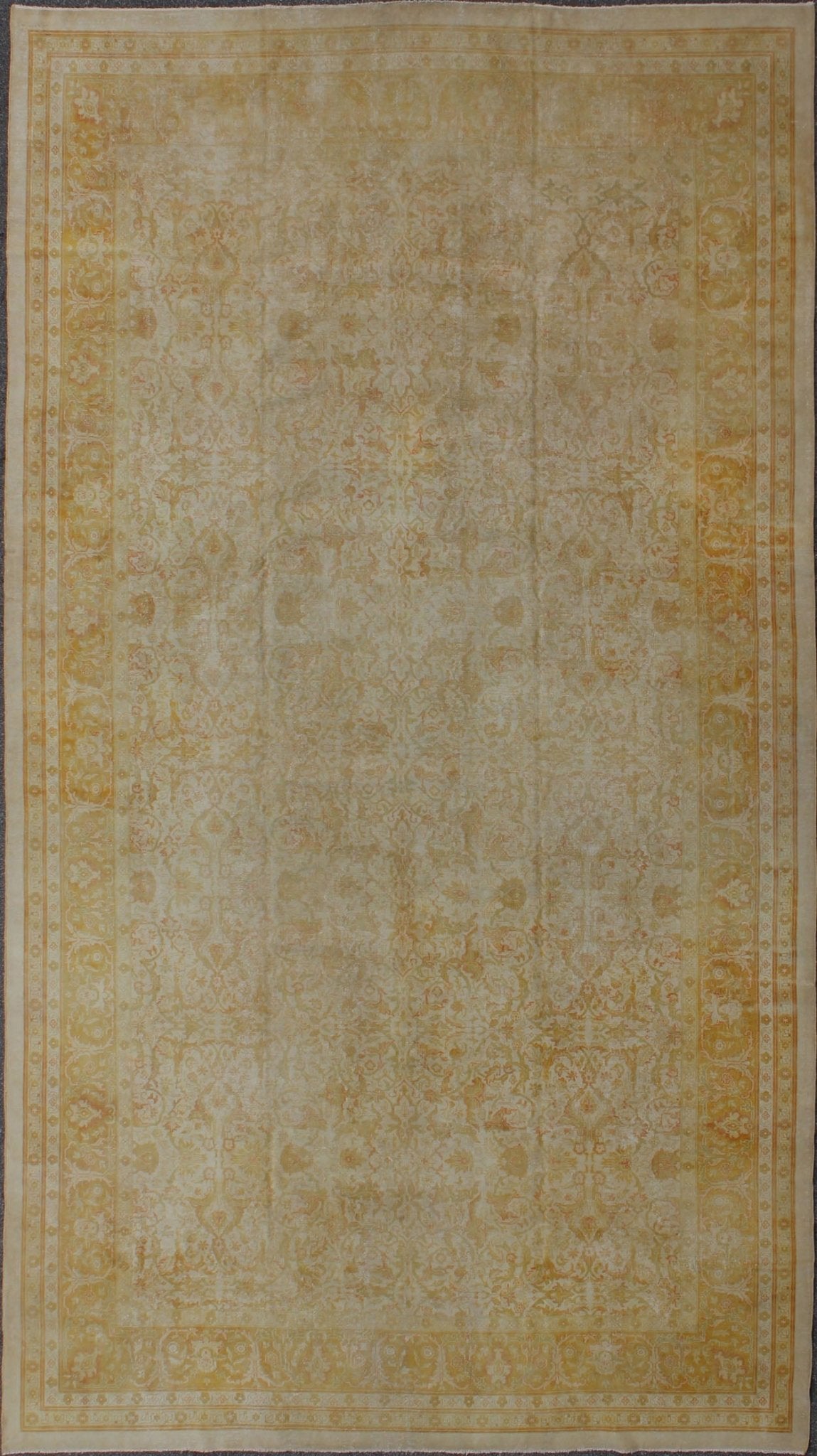 Large All Over Design Distressed Indian Amritsar Rug in Green, Yellow, and Ivory. Large Indian Amritsar distressed Rug in All Over Design in light Green, pale Yellow, and Ivory. rug/ E - 0203 This magnificent distressed rug Indian Amritsar ... - Keivan Woven ArtsE - 0203 - 327