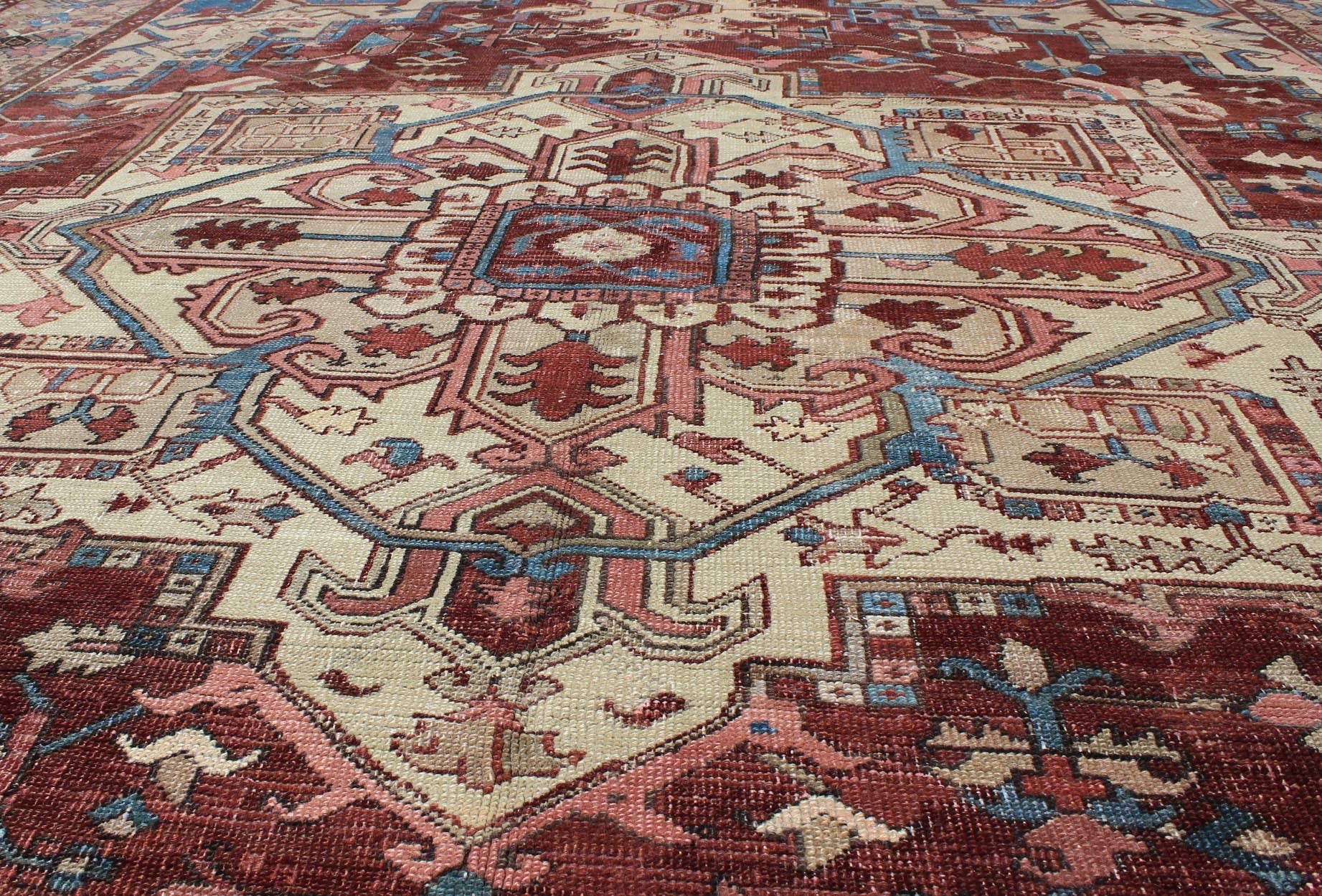 Antique Persian Serapi Carpet With Medallion In Reddish Brown, Tan and Light Blue. Keivan Woven Arts / rug E - 0402, country of origin / type: Iran / Serapi, circa 1890. Measures: 9'10 x 11'10 This late 19th Century Persian Serapi Rug has a center... - Keivan Woven ArtsE - 0402 - 527Rug