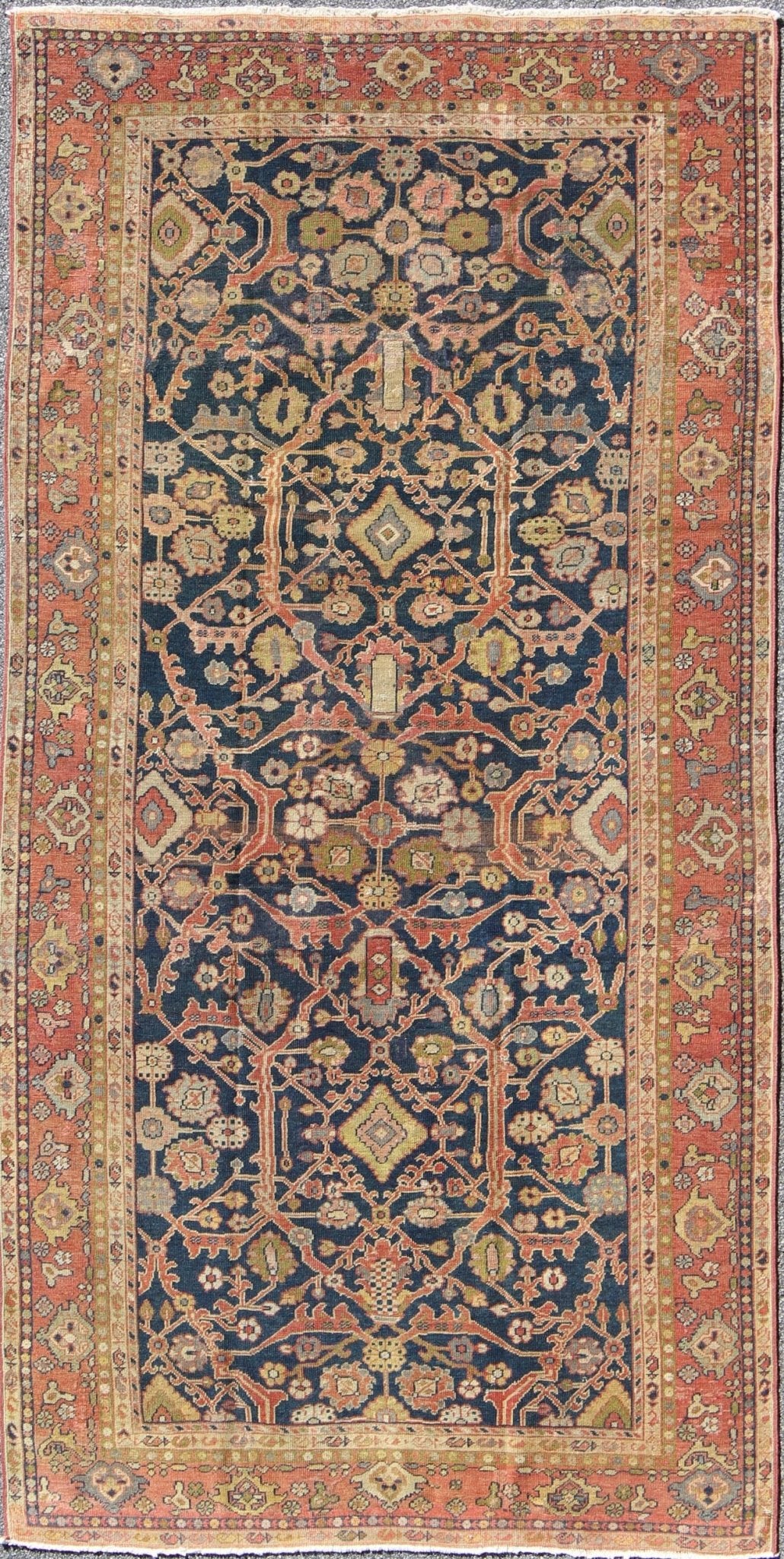 Antique Sultanabad This Antique Sultanabad displays a glorious all - over design imbued with a rich palette of colors. Breathtaking flowers of various colors interweave throughout the main field and are surrounded by a warm - toned border. - Keivan Woven ArtsE - 0512 - 52Rug