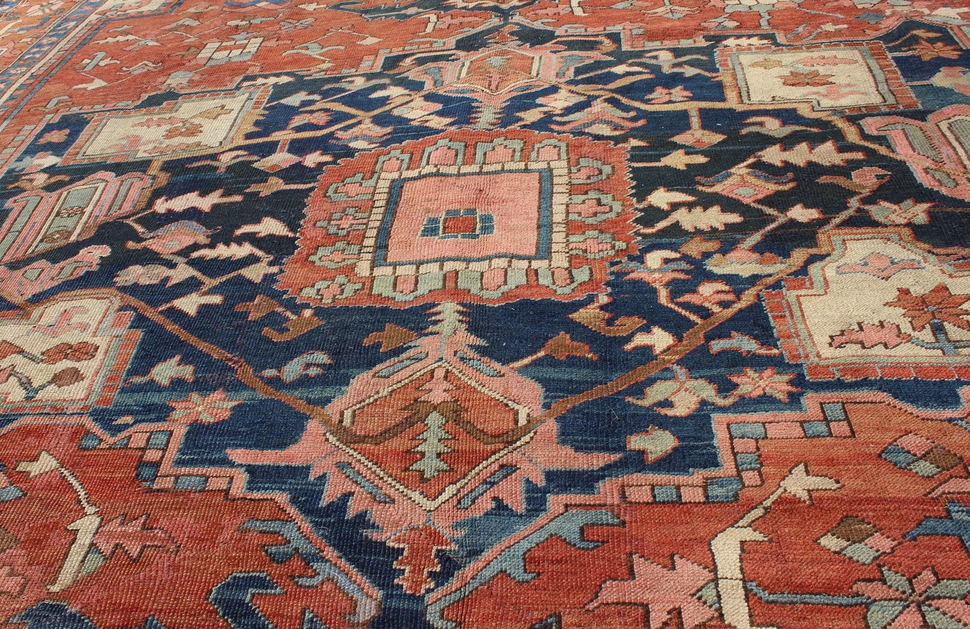 Antique Persian Serapi Rug With Medallion in Rusty - Orange, Blue and Cream's. Keivan Woven Arts / Rug / W22 - 0208, country of origin / type: Iran /Serapi, circa 1910. Antique Heriz, Antique Serapi. Measures: 9'8 x 11'4. Serapi rugs represent the f... - Keivan Woven ArtsE - 0804 - 665Rug