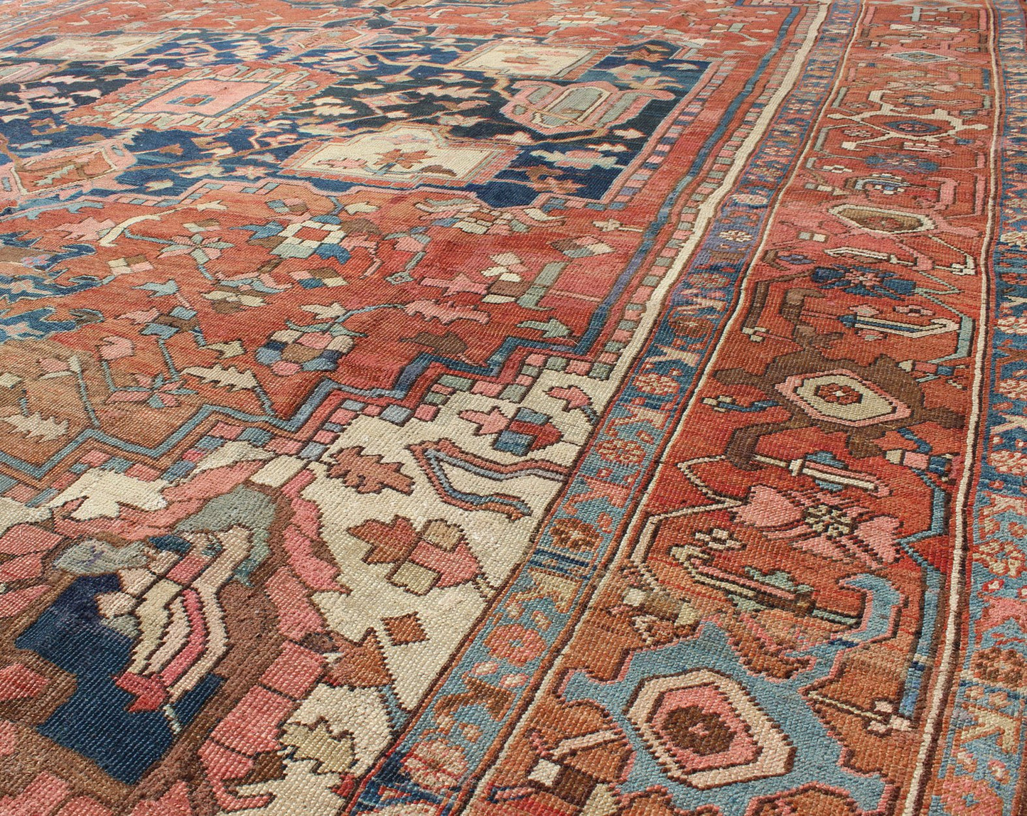 Antique Persian Serapi Rug With Medallion in Rusty - Orange, Blue and Cream's. Keivan Woven Arts / Rug / W22 - 0208, country of origin / type: Iran /Serapi, circa 1910. Antique Heriz, Antique Serapi. Measures: 9'8 x 11'4. Serapi rugs represent the f... - Keivan Woven ArtsE - 0804 - 665Rug