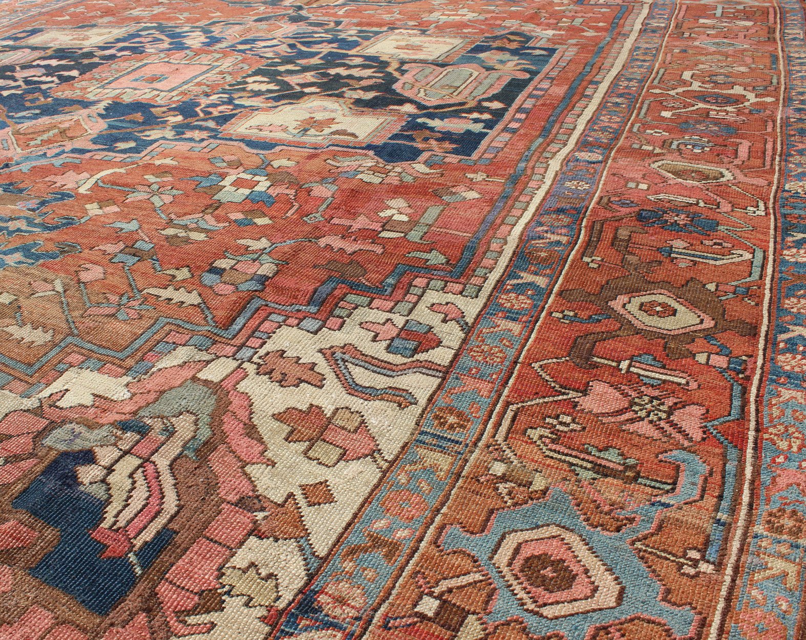 Antique Persian Serapi Rug With Medallion in Rusty - Orange, Blue and Cream's. Keivan Woven Arts / Rug / W22 - 0208, country of origin / type: Iran /Serapi, circa 1910. Antique Heriz, Antique Serapi. Measures: 9'8 x 11'4. Serapi rugs represent the f... - Keivan Woven ArtsE - 0804 - 665Rug