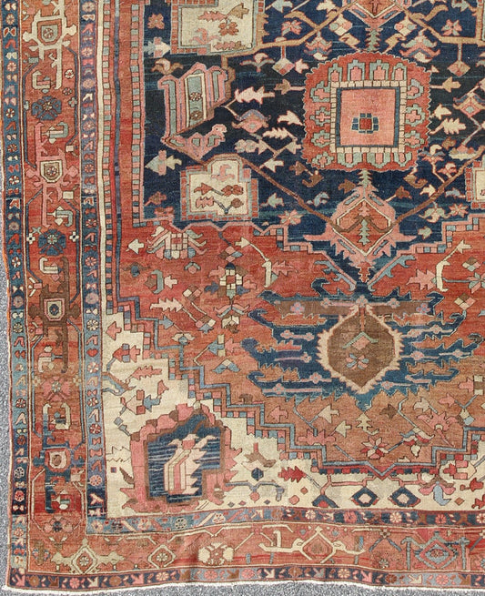 Antique Persian Serapi Rug With Medallion in Rusty - Orange, Blue and Cream's. Keivan Woven Arts / Rug / W22 - 0208, country of origin / type: Iran /Serapi, circa 1910. Antique Heriz, Antique Serapi. Measures: 9'8 x 11'4. Serapi rugs represent the f... - Keivan Woven ArtsE - 0804 - 665Rug